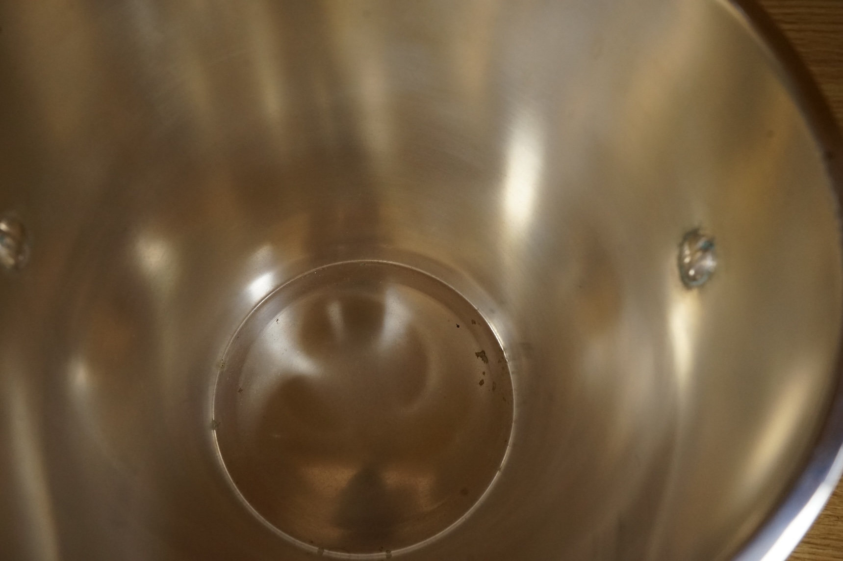 A plated champagne bucket and an ice bucket, St Medard, largest 19cm high